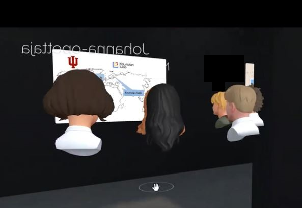 Opiskelijoiden avatarit VR-luokkahuoneessa kartan eteen kerääntyneenä